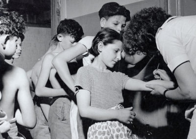 At a JDC-sponsored medical dispensary in Munich, children were inoculated against contagious diseases--a vital part of the health program. Germany, c. 1949.