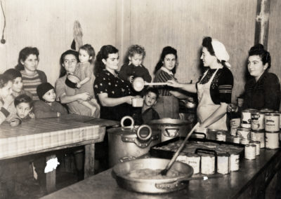 During the war, Babenhausen was a crude barracks used to hold prisoners. The first Jews arriving there, in late September 1946, still faced deplorable conditions. JDC representatives met them with supplementary food and clothing and immediately began efforts to obtain better lodgings for the winter, especially for families with small children. By the time this Polish mother and her children arrived, a substantial community with several schools had been established. Germany, c. 1947.