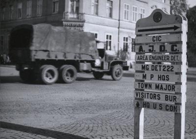 By September 1945, JDC had been given official sanction to aid in the DP camps, and its teams had begun to arrive. In Bamberg, JDC’s headquarters were noted on the U.S. Army camp sign. Germany, c. 1946, Al Taylor.